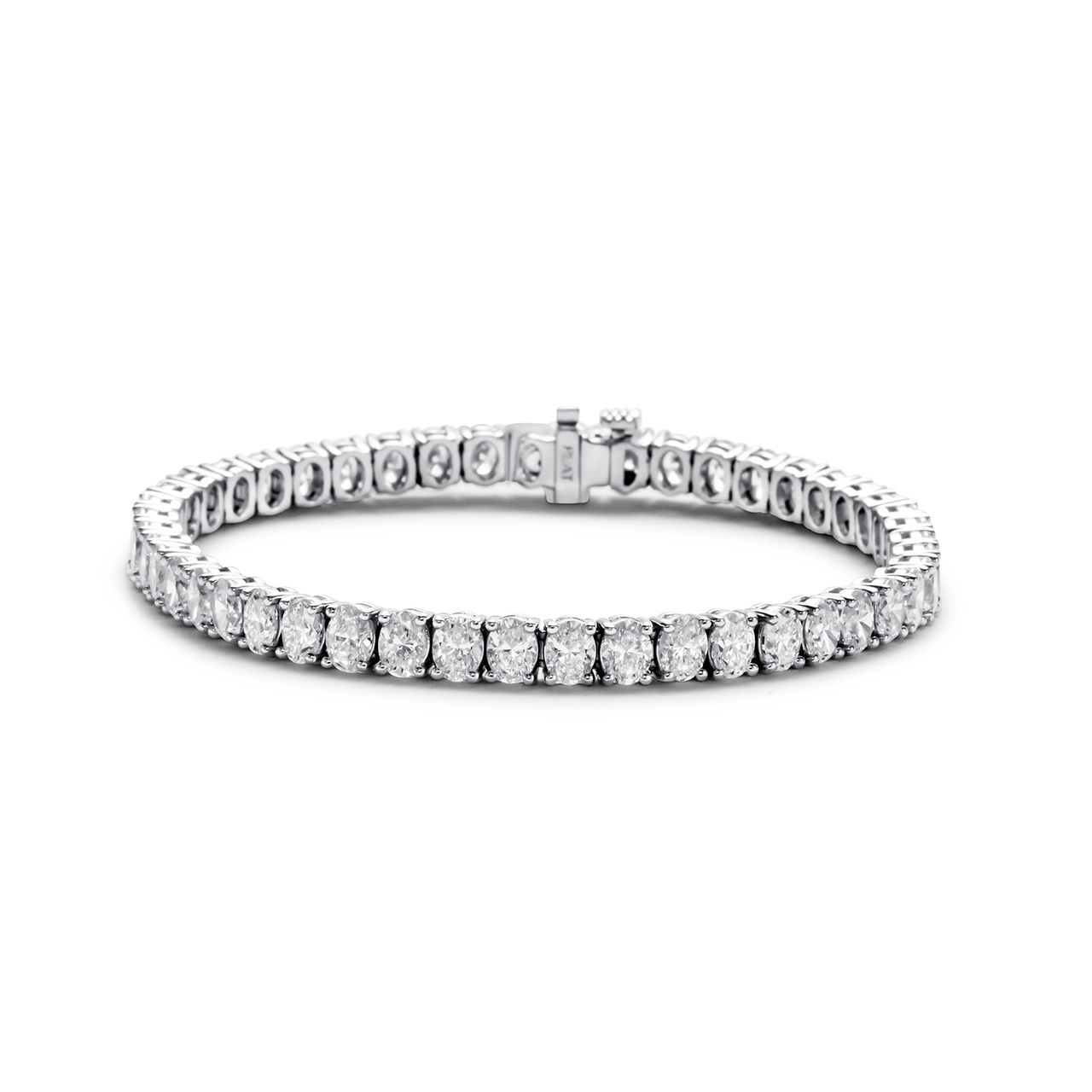 7' Tennis bracelet in platinum with 4-prong set oval diamonds.  D11.15ct.t.w.