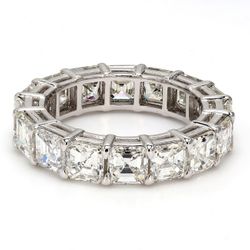 Eternity band in platinum with shared prong set asscher cut diamonds.  D6.28ct.t.w.