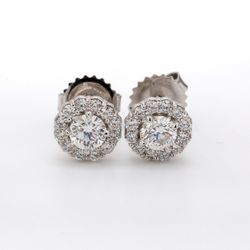 Push back halo stud earrings with prong set round diamonds.  D0.97ct.t.w.