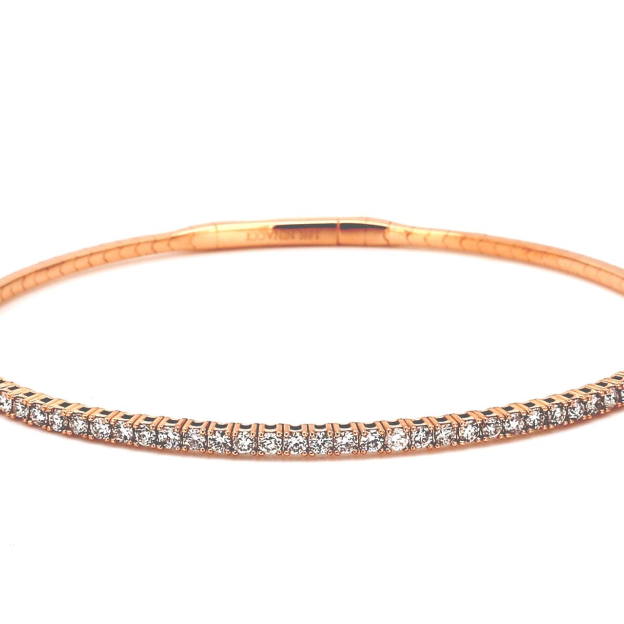 Flexible bangle in 18K RG with pre-set round diamonds.  D1.01ct.t.w.