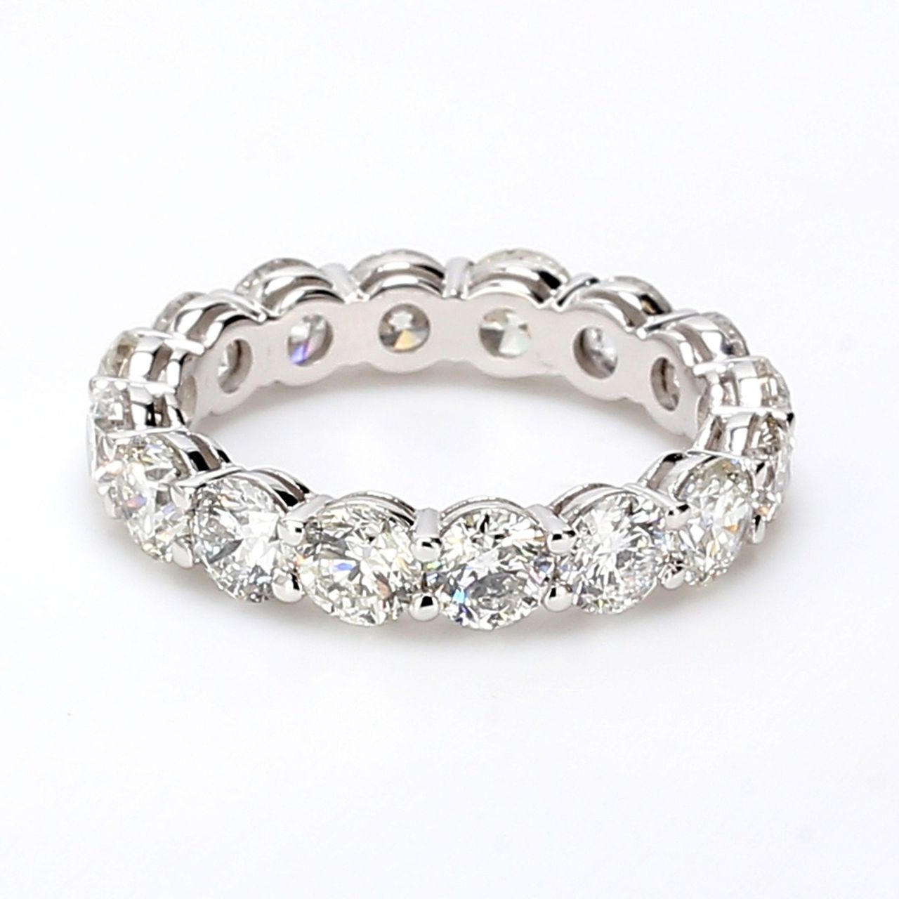 Eternity band with shared 4-prong set round diamonds.  D4.69ct.t.w.  Size 7