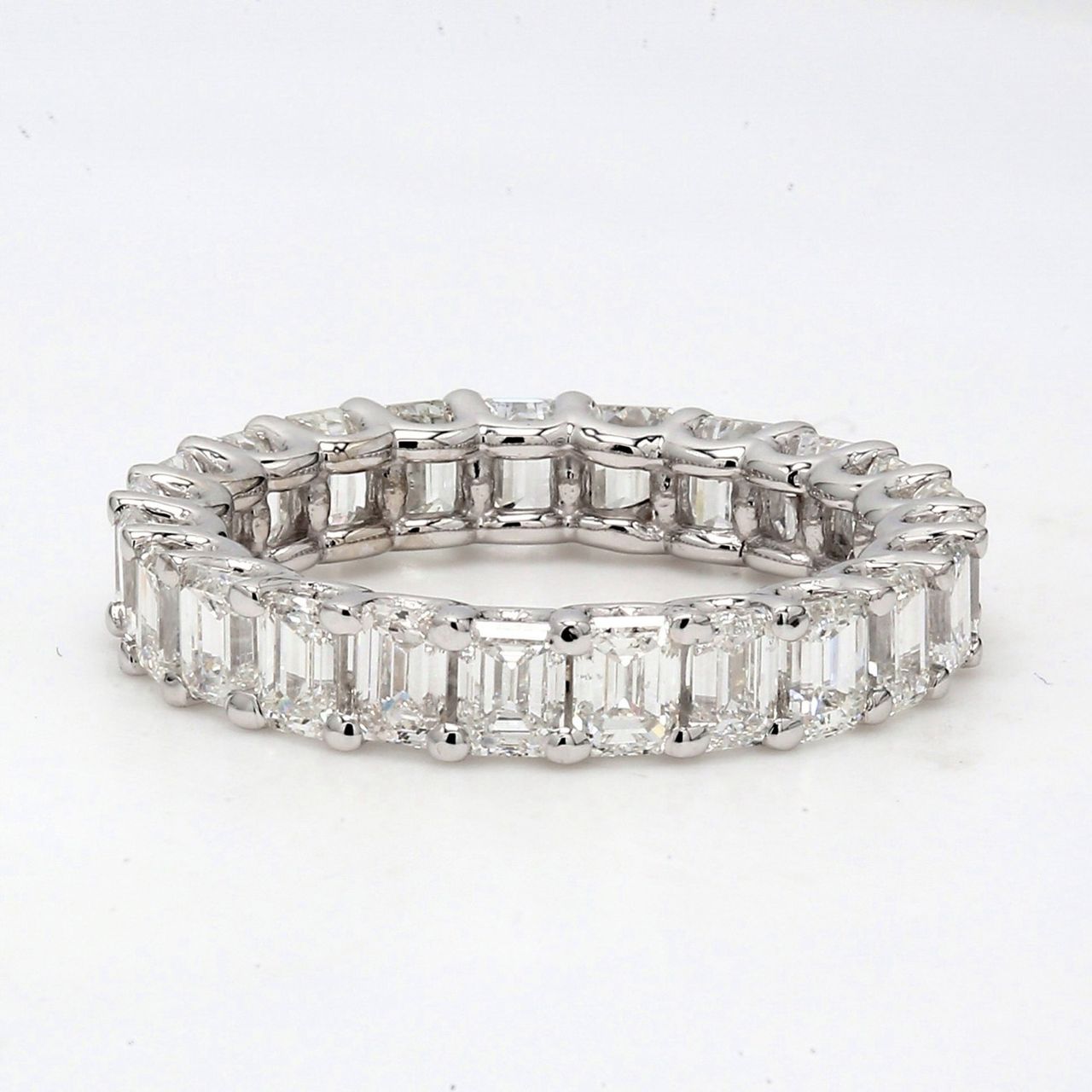 Eternity band in 18K WG with U-prong set (23) emerald cut diamonds.  D4.61ct.t.w.  Size 6