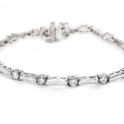 7' Link bracelet with prong set (15) round diamonds.  D1.80ct.t.w.