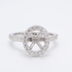 Halo semi-mount with U-prong set round diamonds.  D0.56ct.t.w.  Size 6