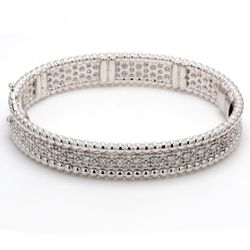 Bangle in 18K WG with pave set (204) round diamonds.  D2.67ct.t.w.