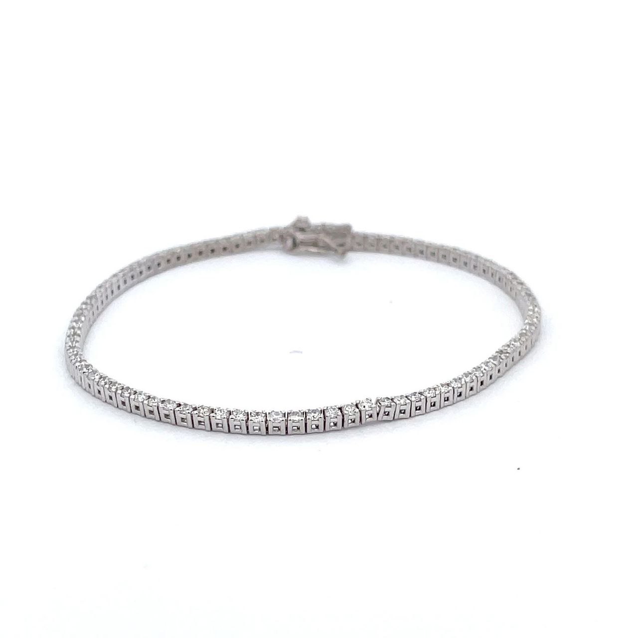 7' Tennis bracelet with basket prong set (92) round diamonds.  D1.41ct.t.w.