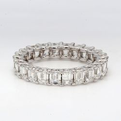 Eternity band with shared U-prong set (24) emerald cut diamonds.  D3.60ct.t.w.  Size 6