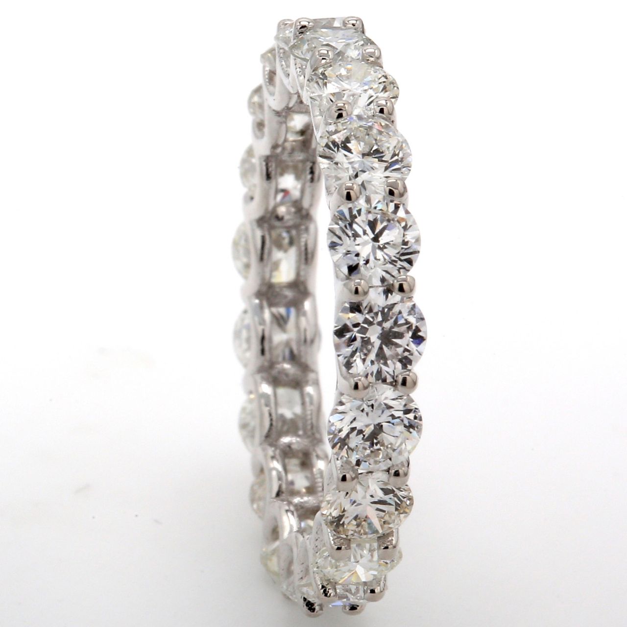 Eternity band in 18K WG with U-prong set (19) round diamonds.  D2.56ct.t.w.  Size 5.25