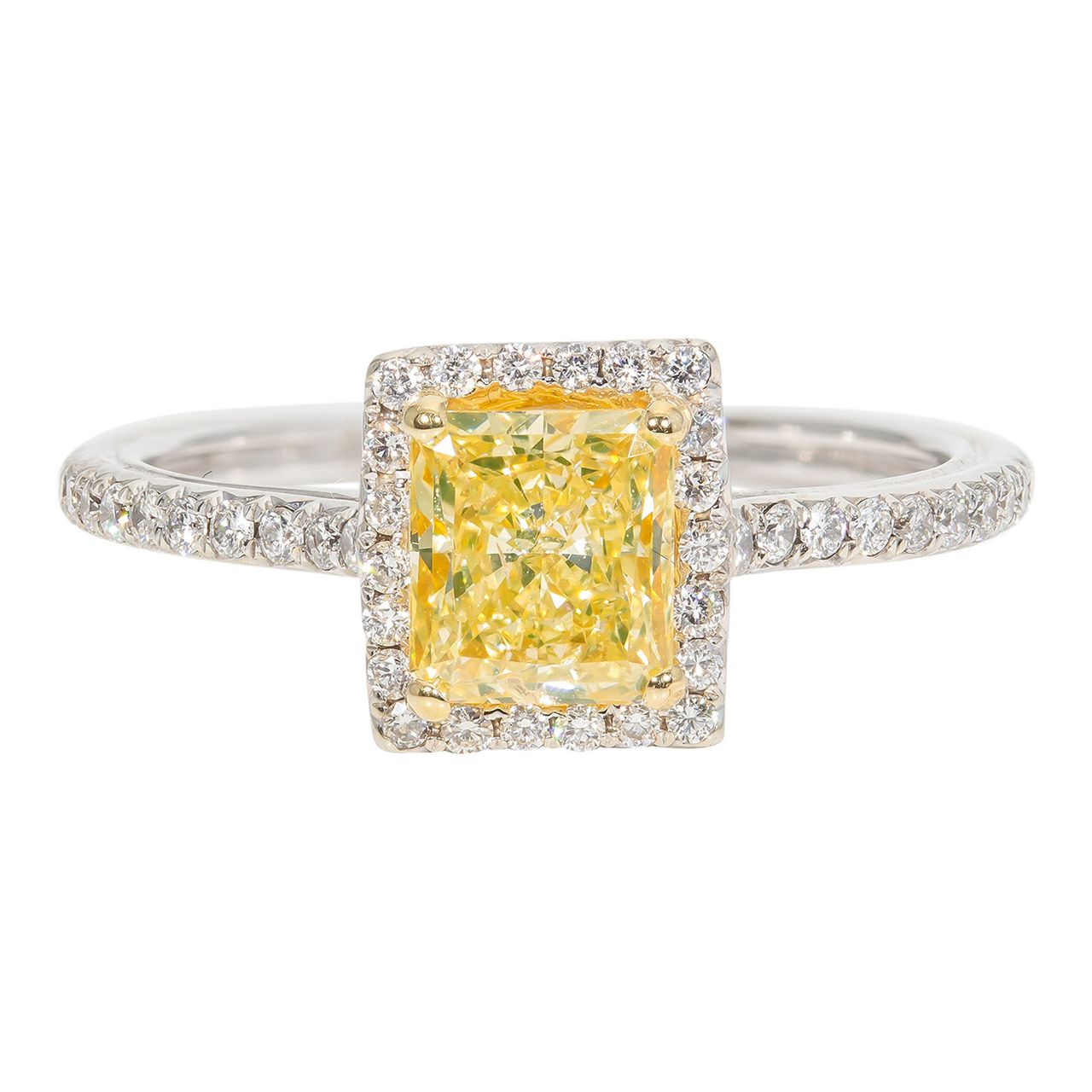 Halo ring with French pave set roundds around 4-prong set GIA certified FY/SI1 radiant cut diamond center stone.  D1.30ct.t.w.  (Center 1.05ct.)