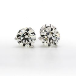 Screw back martini style stud earrings with 3-prong set round diamonds.  D3.00ct.t.w.