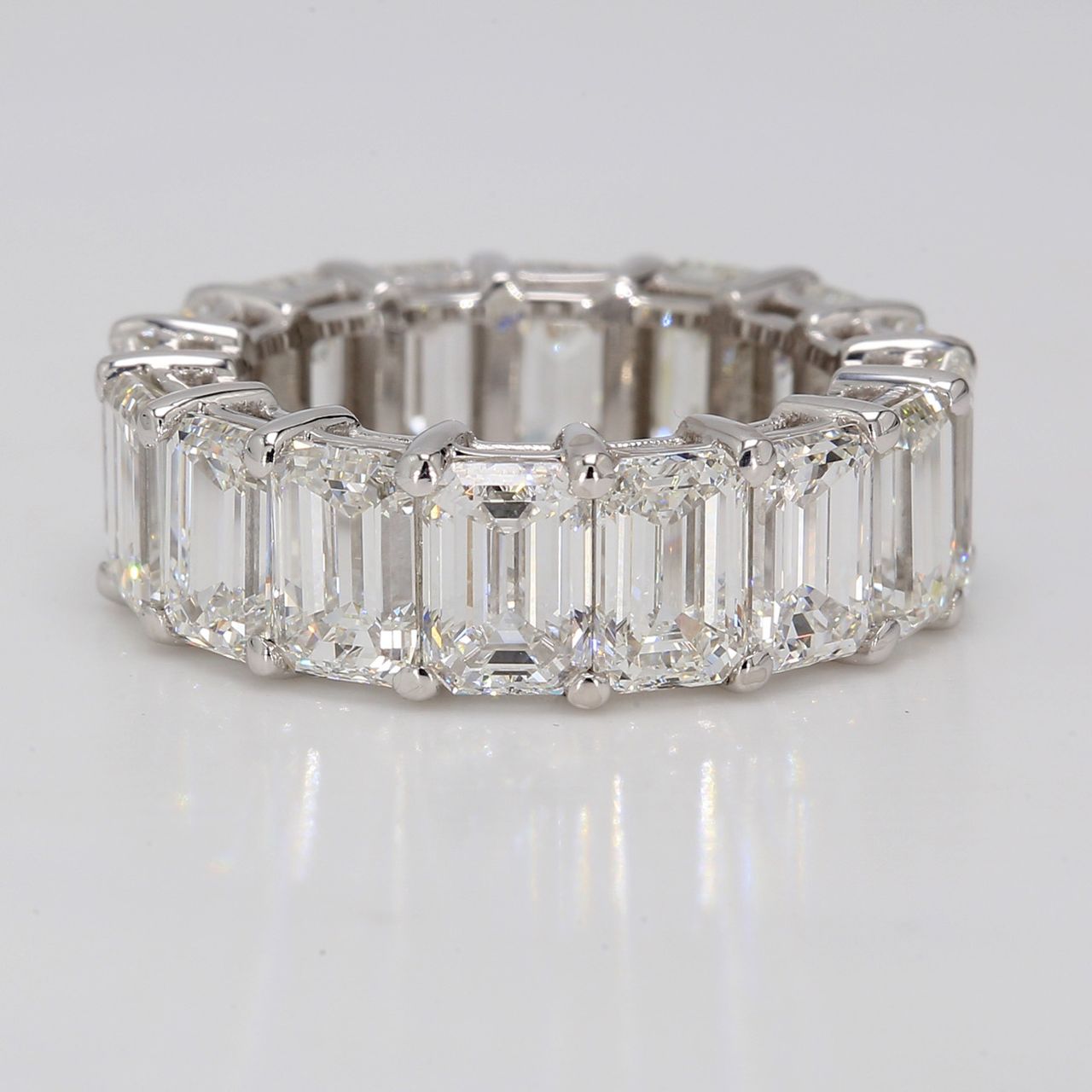 Eternity band in 18K WG with shared prong set (20) emerald cut diamonds.  D5.43ct.t.w.  Size 6