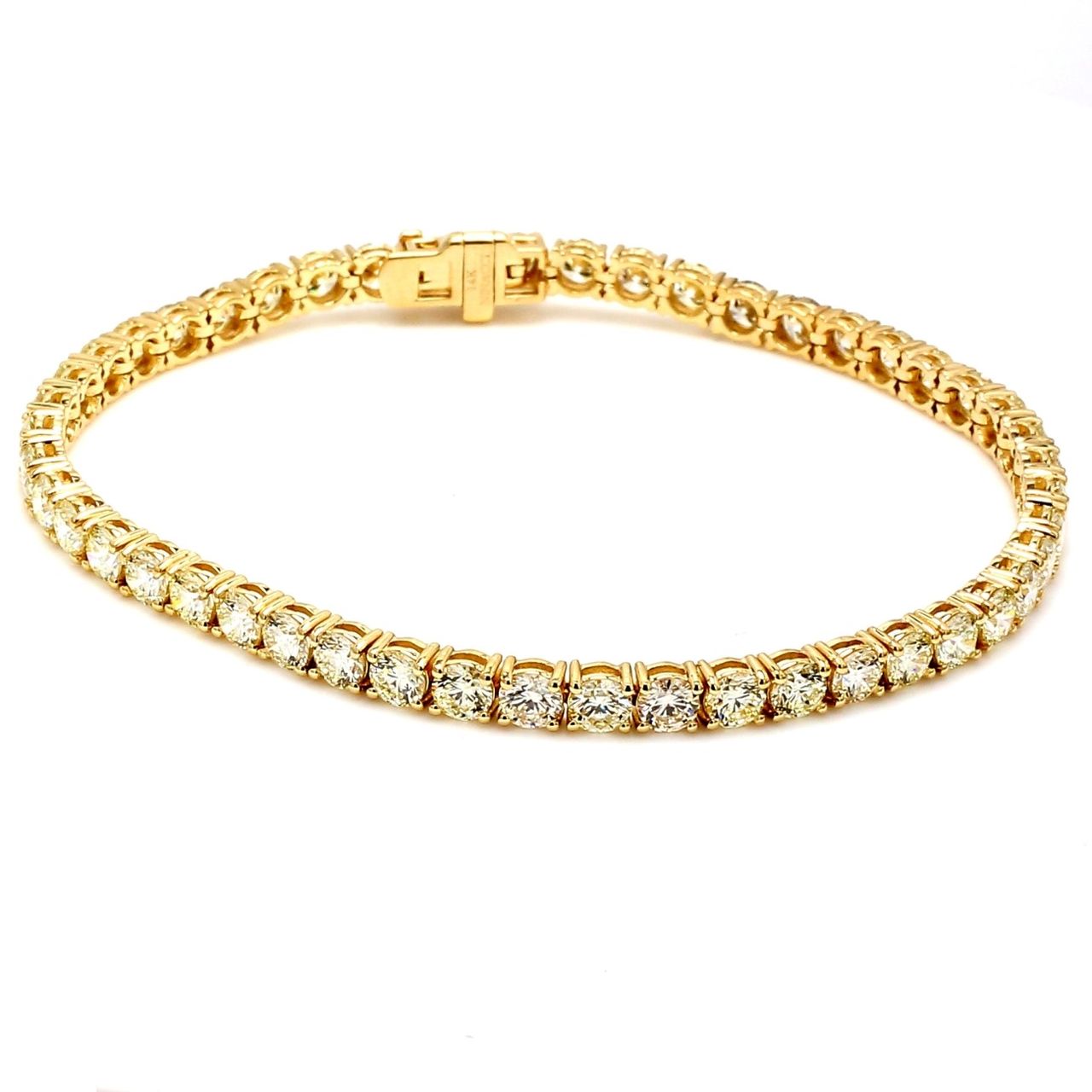 7' Tennis bracelet with basket prong set (48) round diamonds.  D7.74ct.t.w.