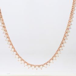 18' Tennis necklace in 14K RG with 3-prong set round diamonds.  D11.84ct.t.w.