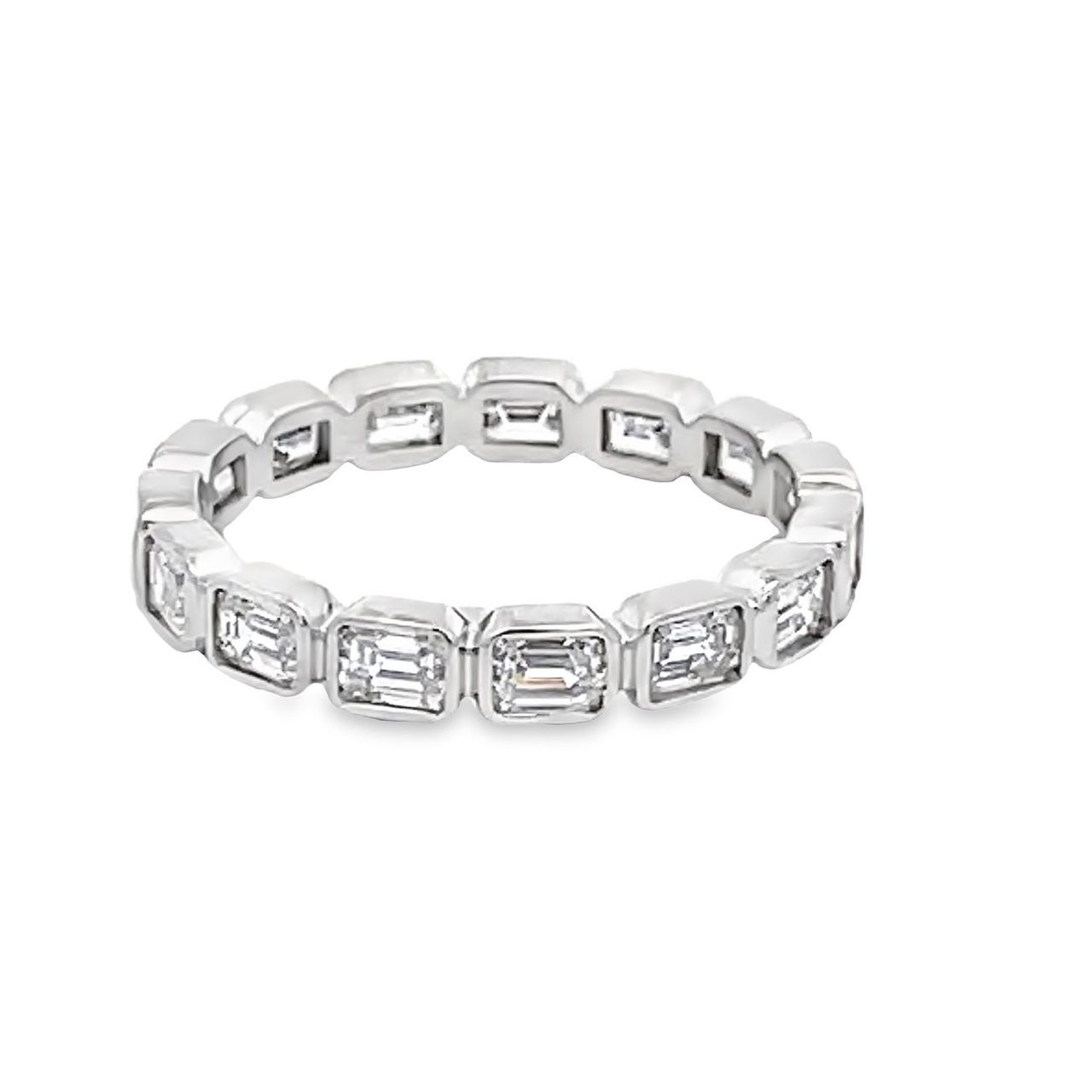 Eternity band east west style in 18K WG with bezel set (15) emerald diamonds.  D1.71ct.t.w.  Size 6