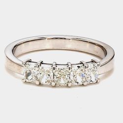 5-stone band in platinum with basket prong set radiant cut diamonds.  D0.72ct.t.w.  Size 5.5