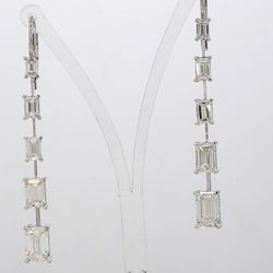 1.5'Dangling earrings in 18K WG with graduated prong set J/IF-VS2 emerald cut diamonds.  D4.72ct.t.w.
