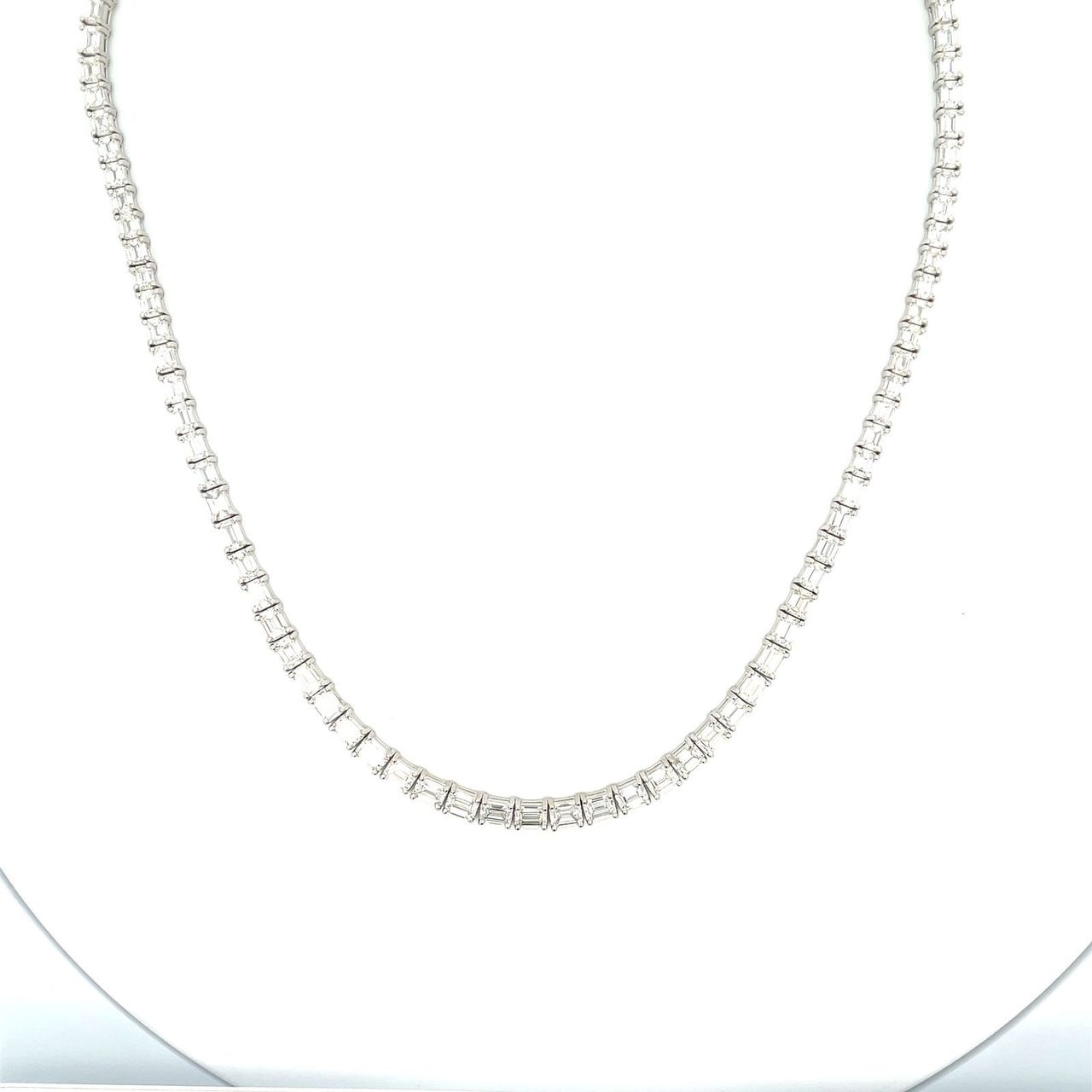 16.5' Tennis necklace east to west style in platinum with 4-prong set emerald cut diamonds.  D20.91ct.t.w.