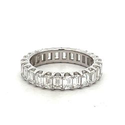 Eternity band in platinum with prong set (26) emerald cut diamonds.  D2.88ct.t.w.  Size 5