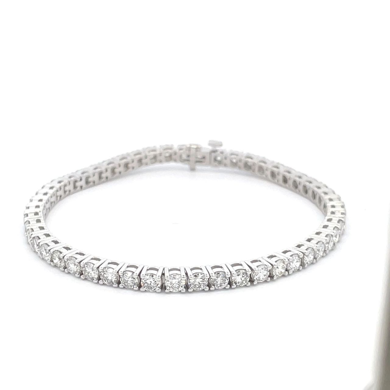 7' Tennis bracelet with basket prong set (85) round diamonds.  D2.20ct.t.w.