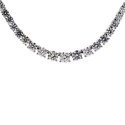 16' Half way graduated tennis necklace in 18K WG w/ 4-prong set round diamonds.  D5.92ct.tw.