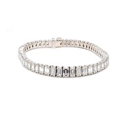 7' Graduated tennis bracelet in platinum with 4-prong basket set F-G/VS-SI emerald cut diamonds.  D13.52ct.t.w.  (Center 0.50ct.)