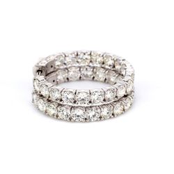 1' Inside out hoop earrings with 4-prong set round diamonds.  D6.93ct.t.w.