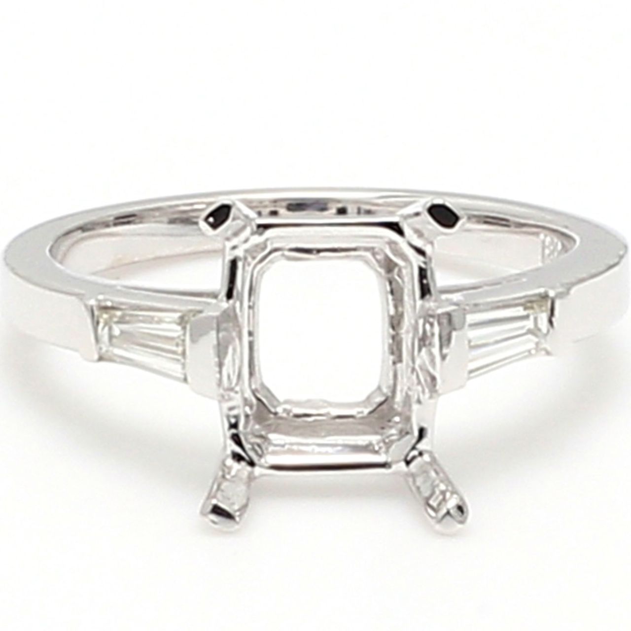 3-stone semi-mount in 18K WG with tapered baguette diamond sides.  D0.23ct.t.w.