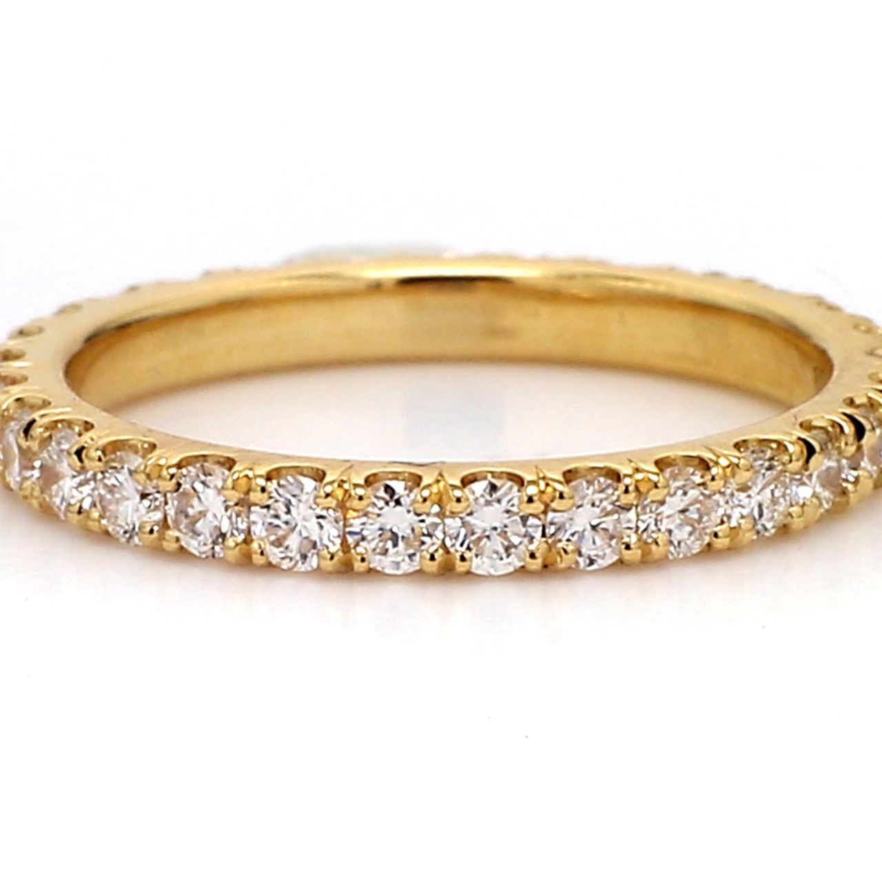 Eternity band in 18K YG with U-prong set (29) round diamonds.  D0.84ct.t.w.  Size 5