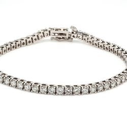 7' Tennis bracelet in platinum with (57) round diamonds.  D4.44ct.t.w.