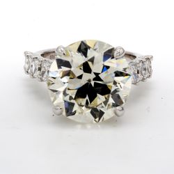 Semi-mount in 18K WG shared U-prong set radiant cuts & pave set round diamonds.  D2.00ct.t.w.