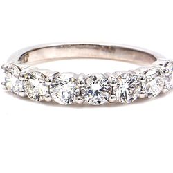 7-stone band in platinum with prong set round diamonds.  D1.00ct.t.w.  Size 5