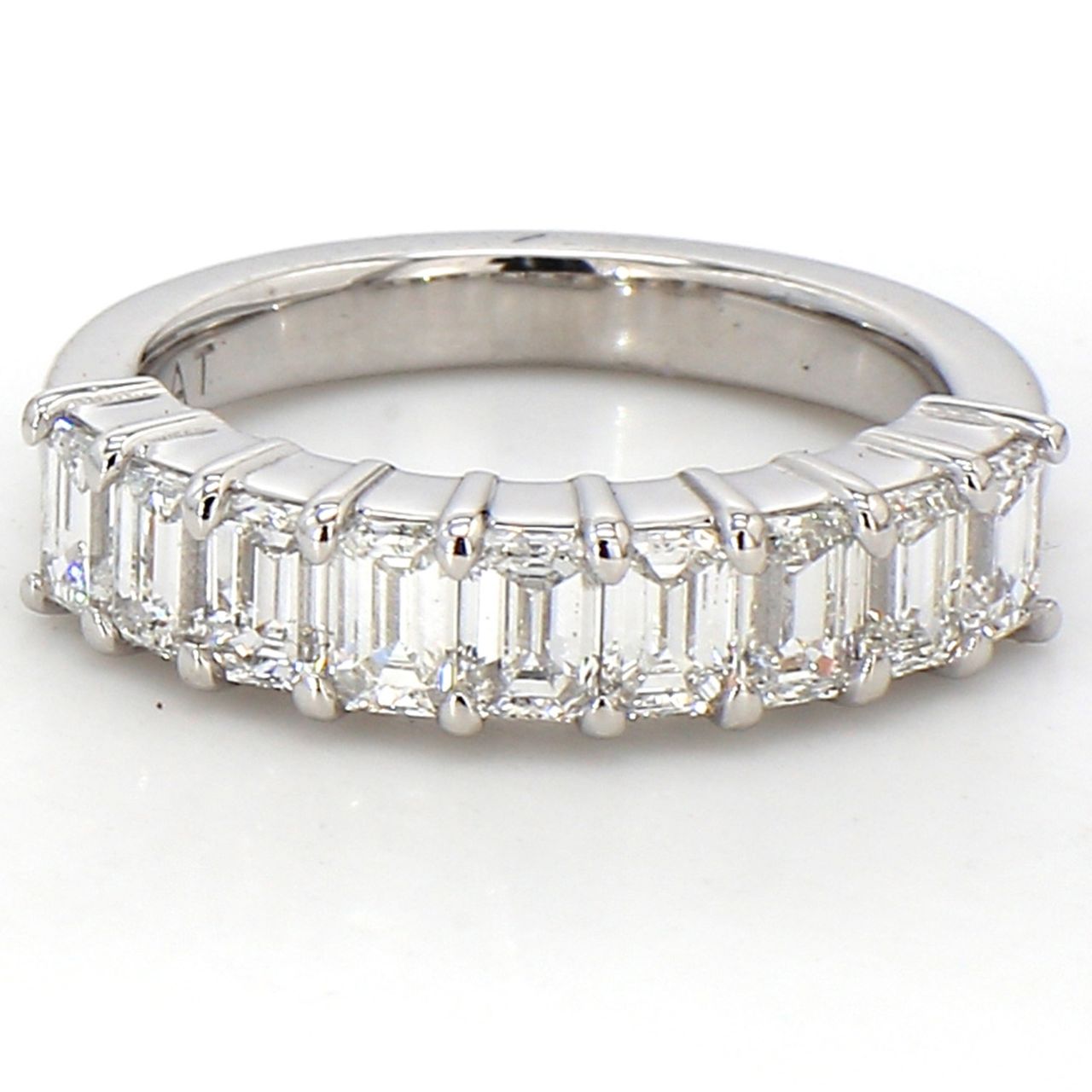 9-stone band in platinum with prong set emerald cut diamonds.  D1.29ct.t.w.  Size 4.5
