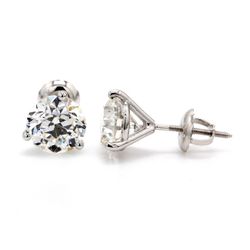 Screw back stud earrings with 3-prong set GIA certified F/SI2 round diamonds. D3.01ct.t.w.